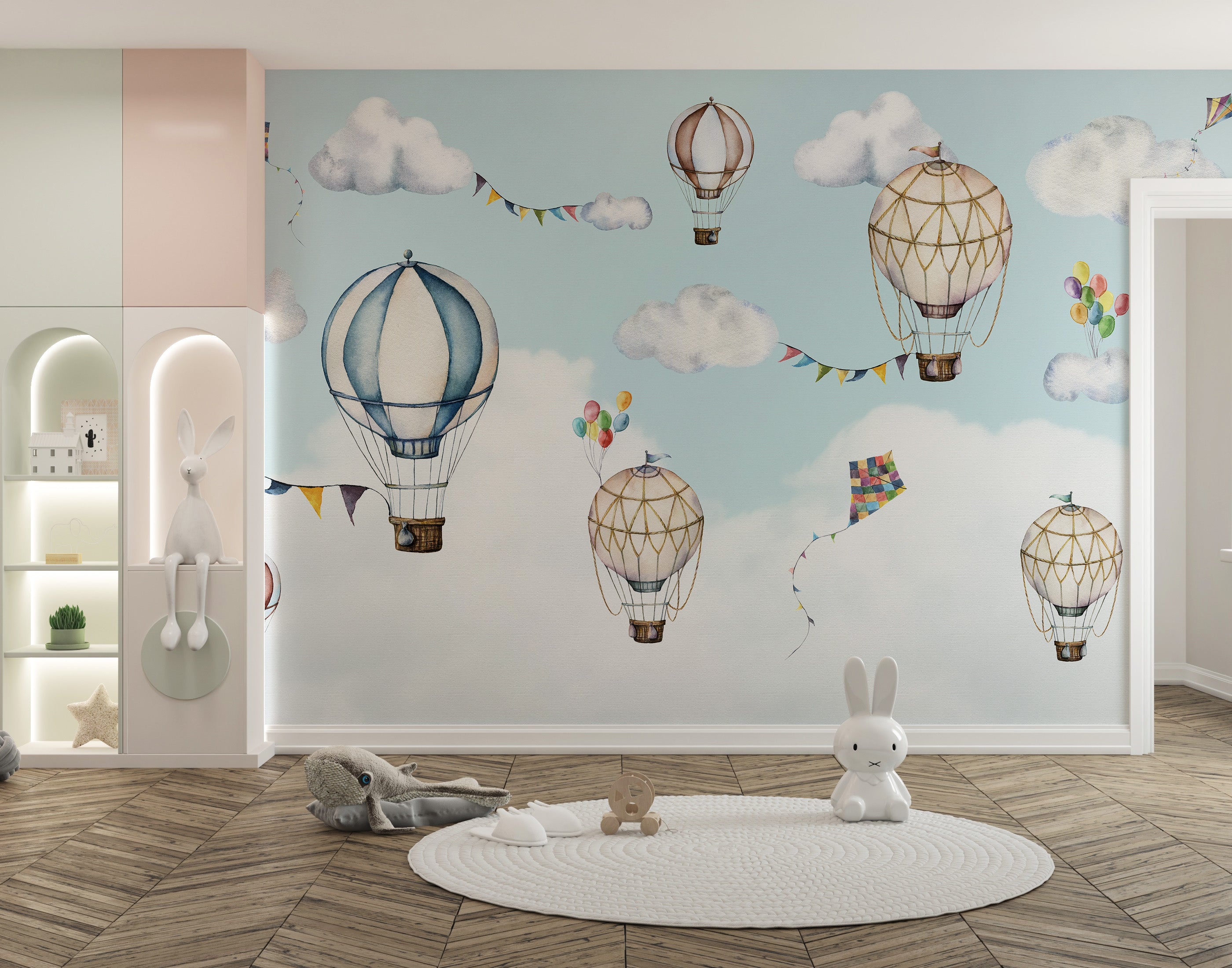 Pastel hot air balloons with bunting and kites in the sky