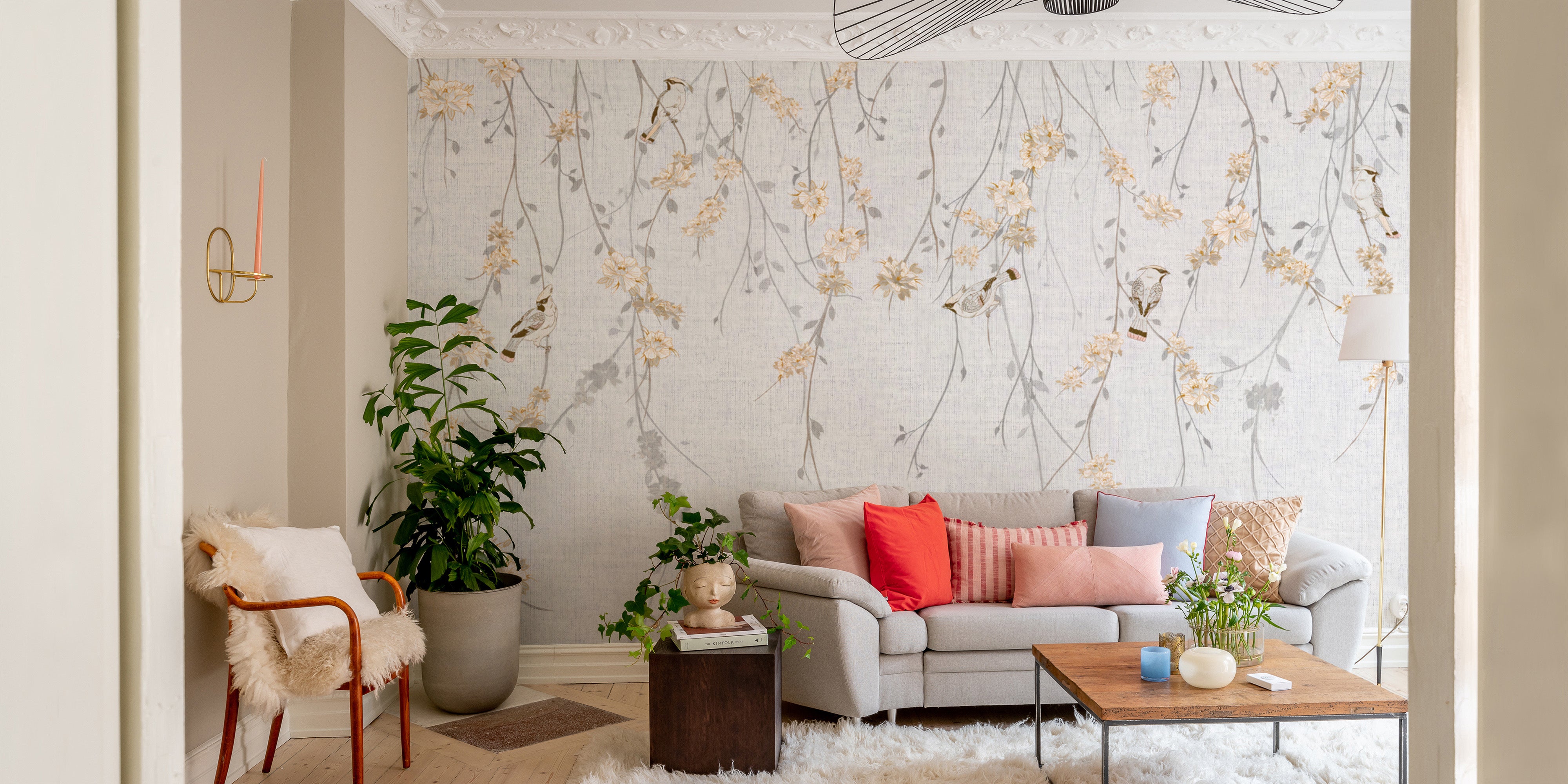 Botanical wallpaper with hanging flowers and perched birds
