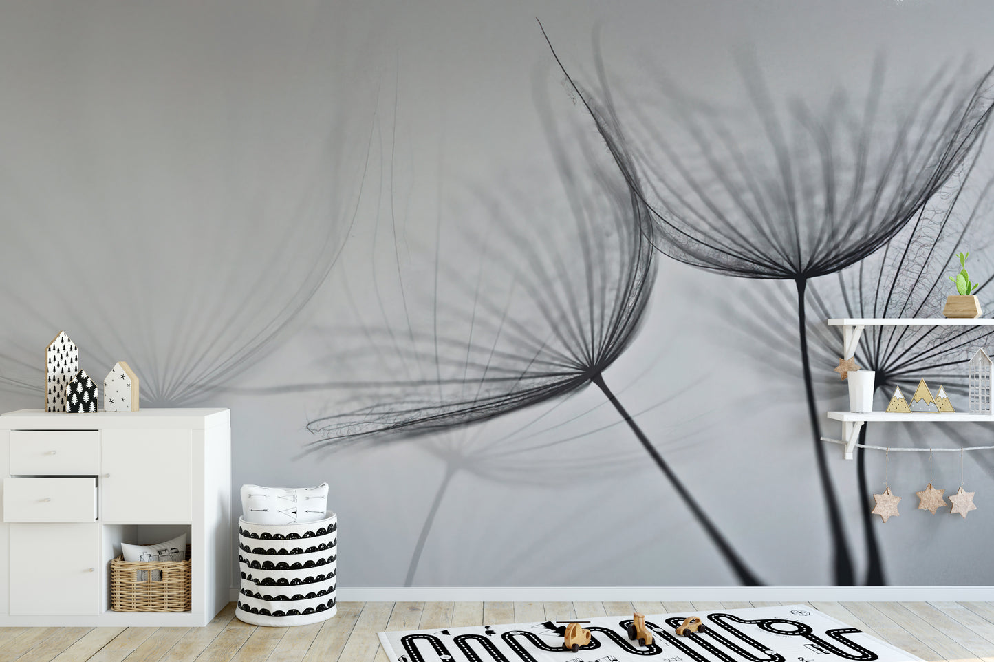 Serene dandelion seed wall mural in grayscale tones
