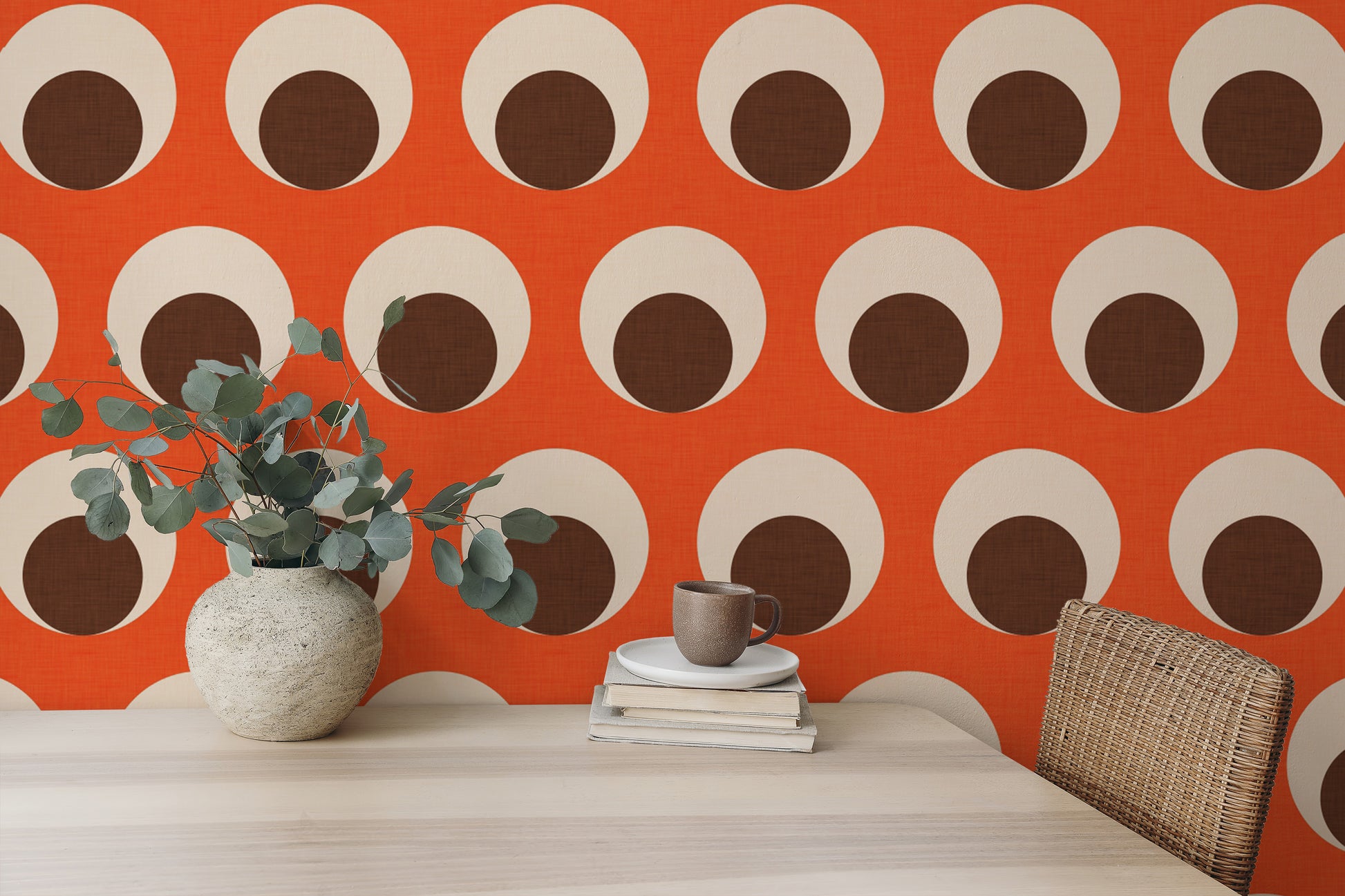 Classic dot-patterned wallpaper in orange hues
