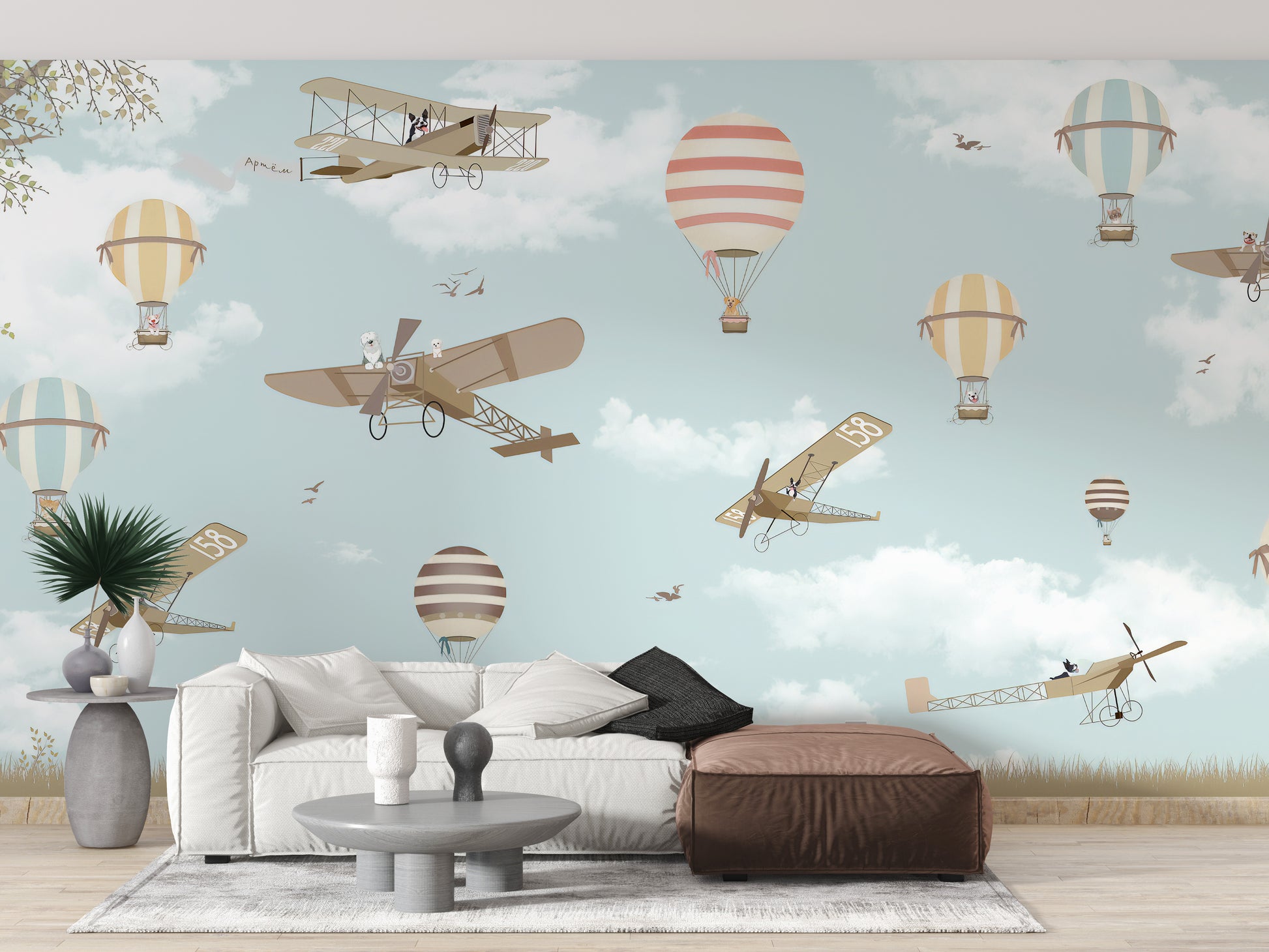 Fun land-themed wall mural with balloons
