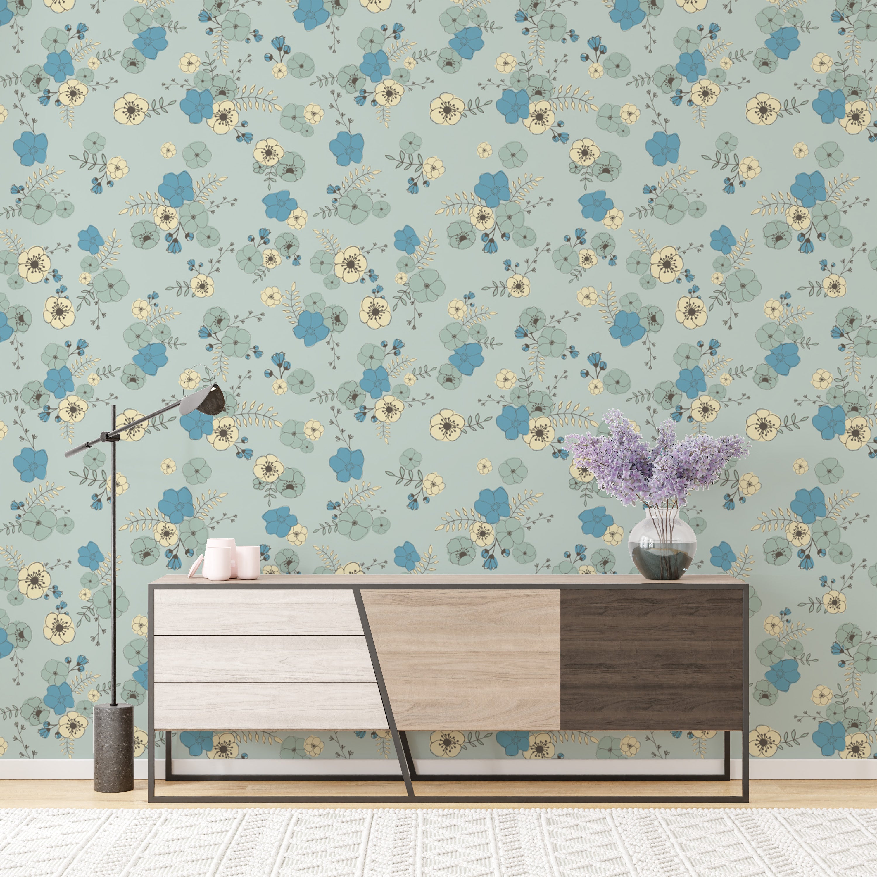 Elegant pastel blue wallpaper featuring delicate floral patterns.
