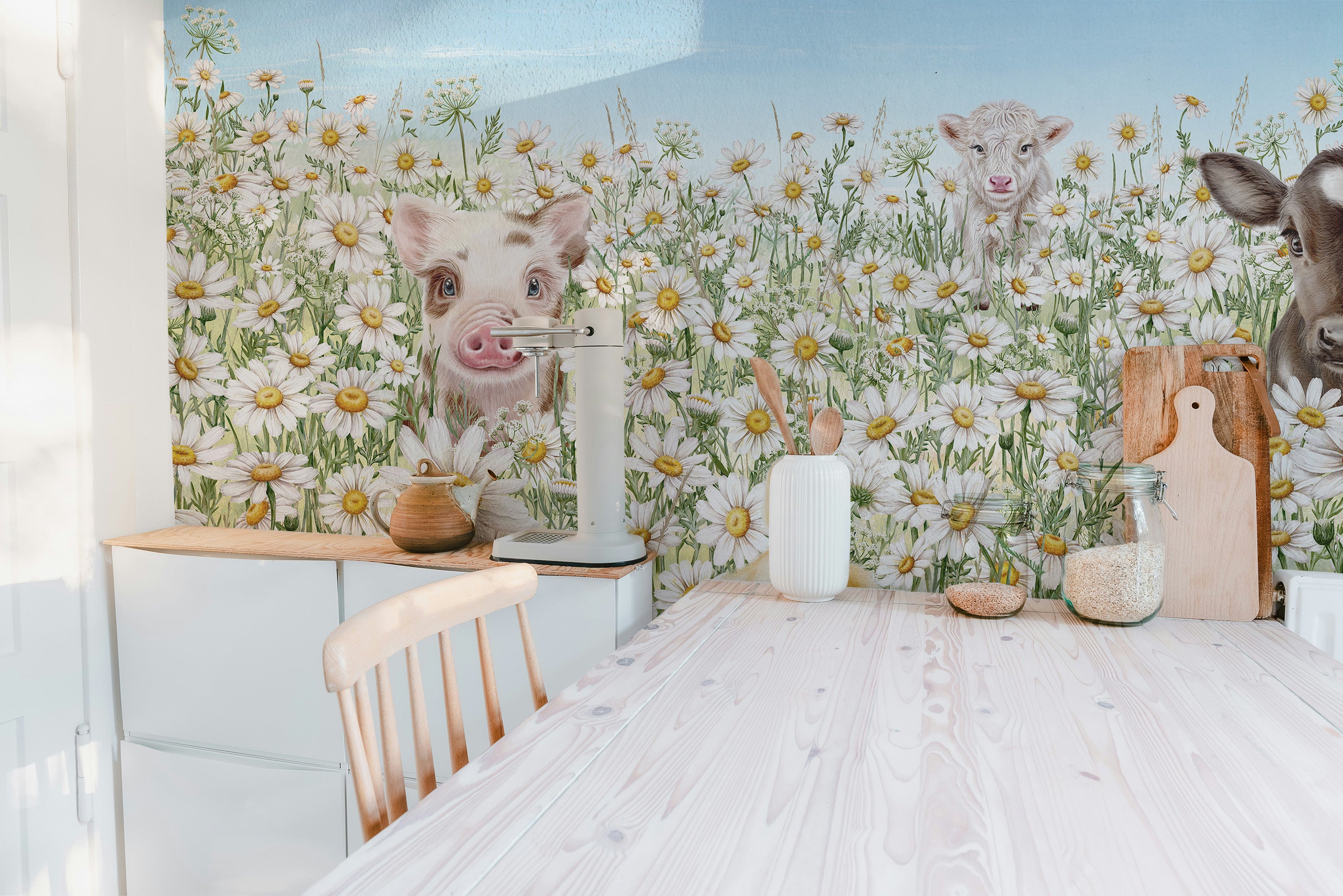 Cute farm animal designs on a lively wallpaper mural.
