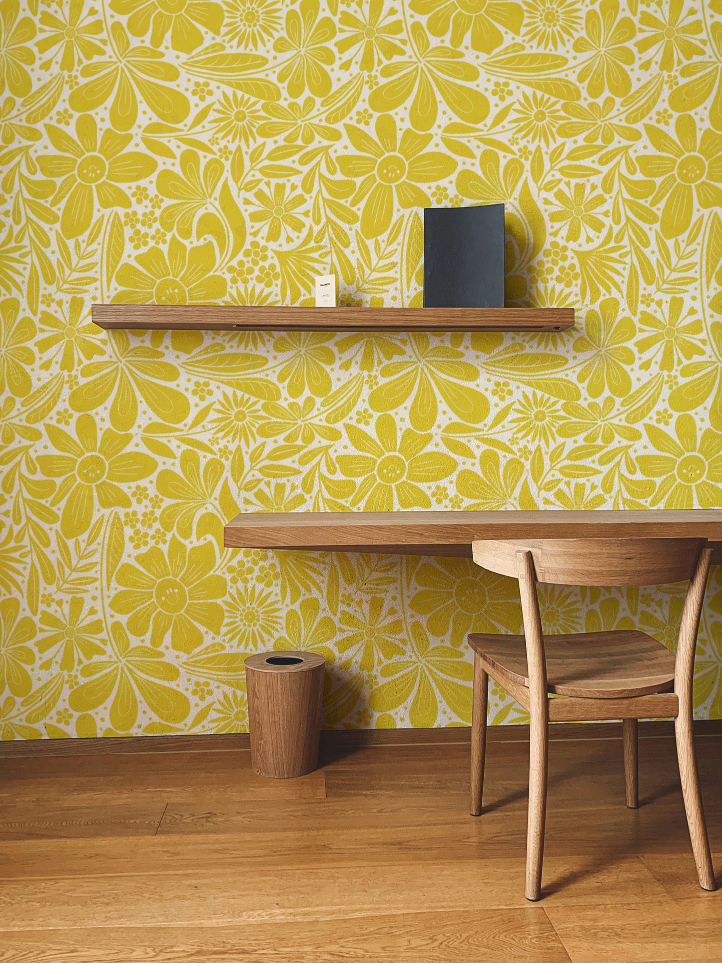 Radiant happy blooms wallpaper in a sunny yellow hue.
