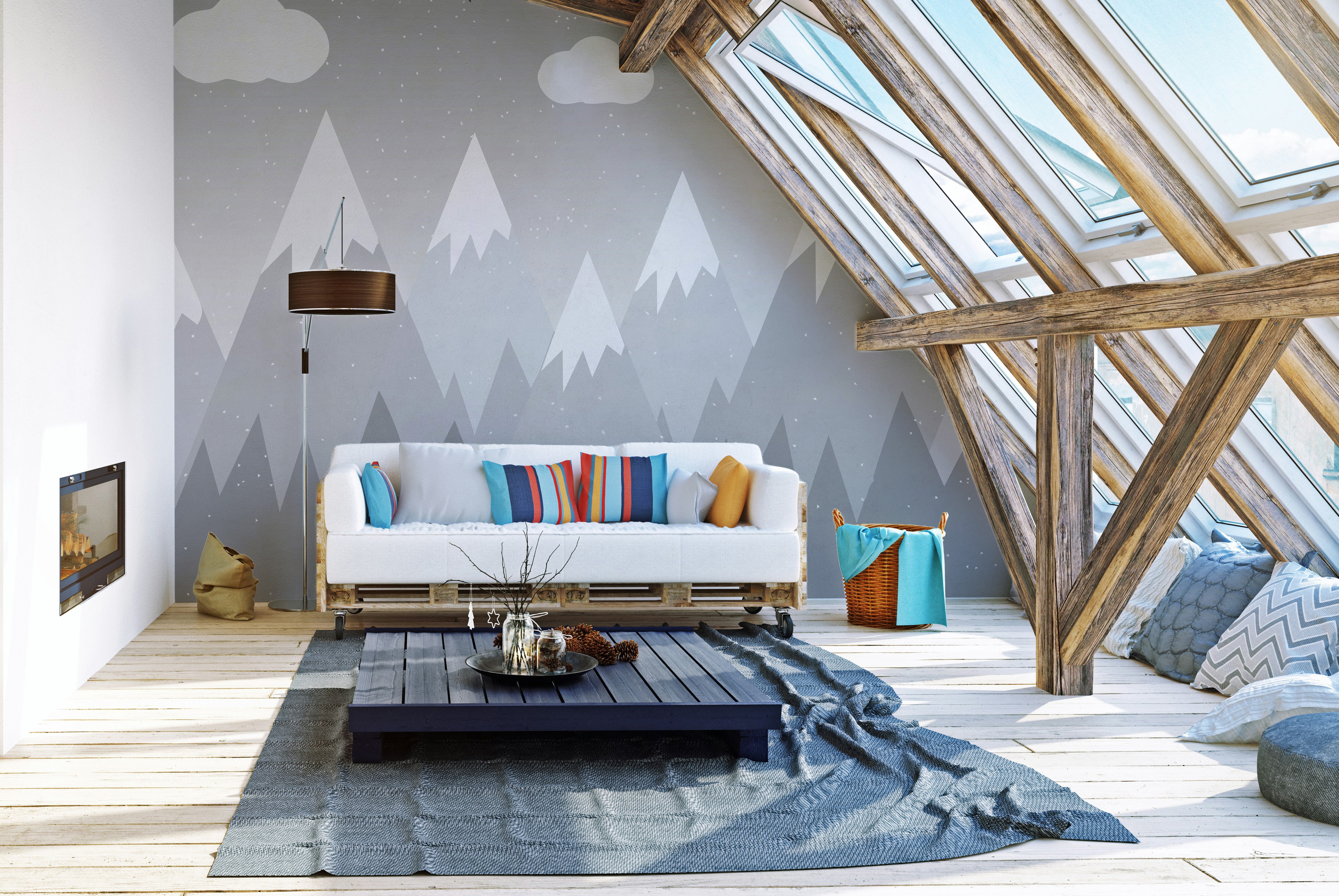 Modern kids' mural featuring grey mountains and playful accents.