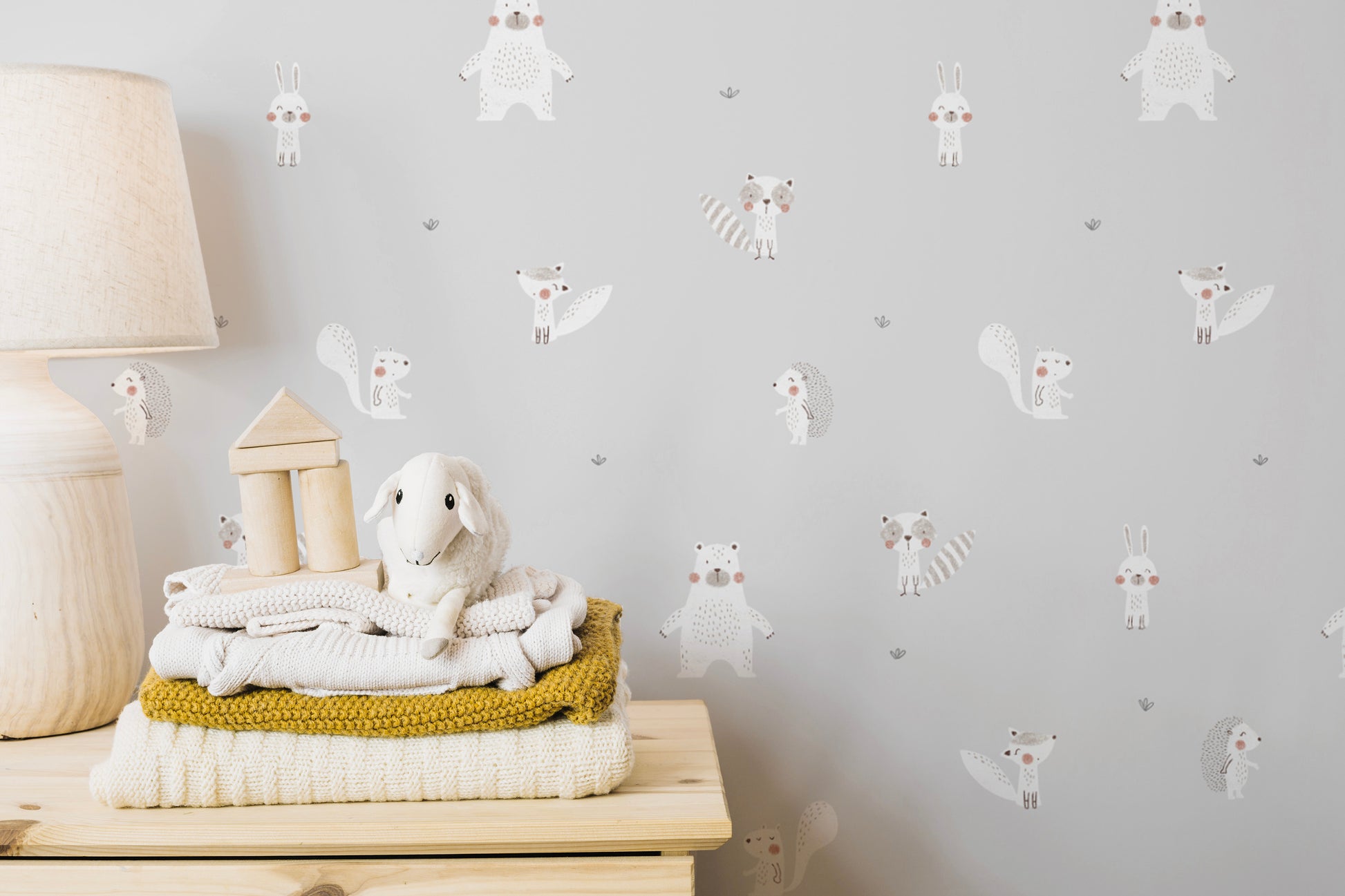 Charming cream forest friends mural with a soft, neutral tone.