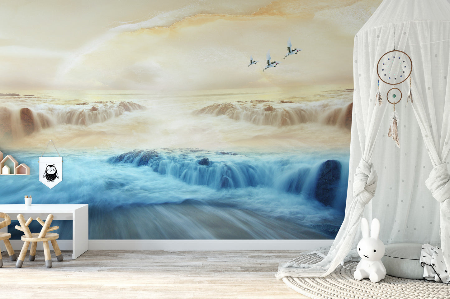 Tranquil wall mural with misty mountains, sun, and flying cranes.
