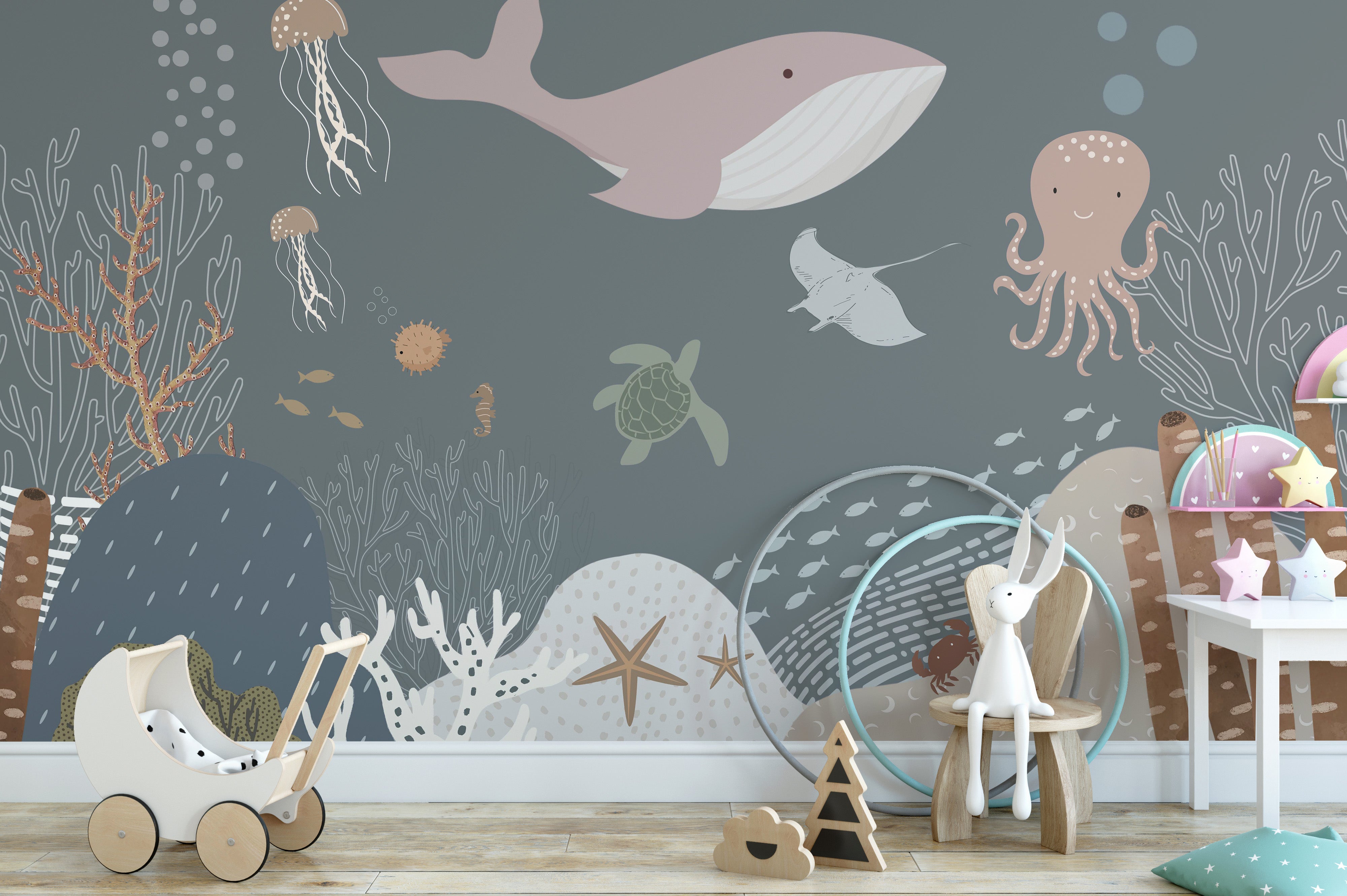 Aqua-themed ocean mural with playful fish.
