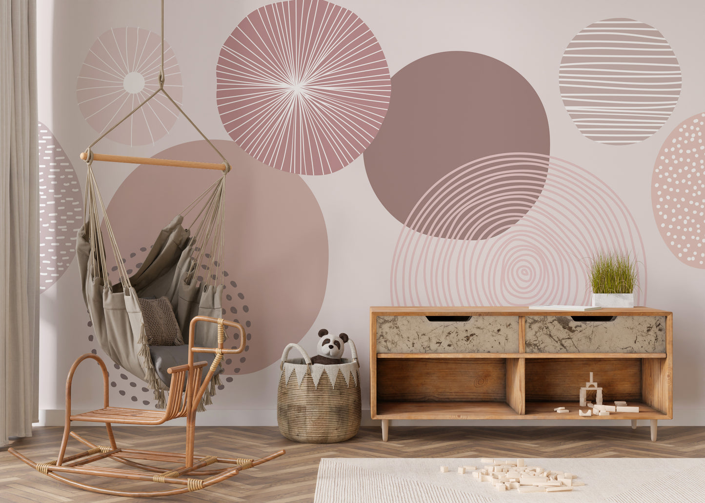 Contemporary wallpaper in dusky mauve with layered circle patterns.