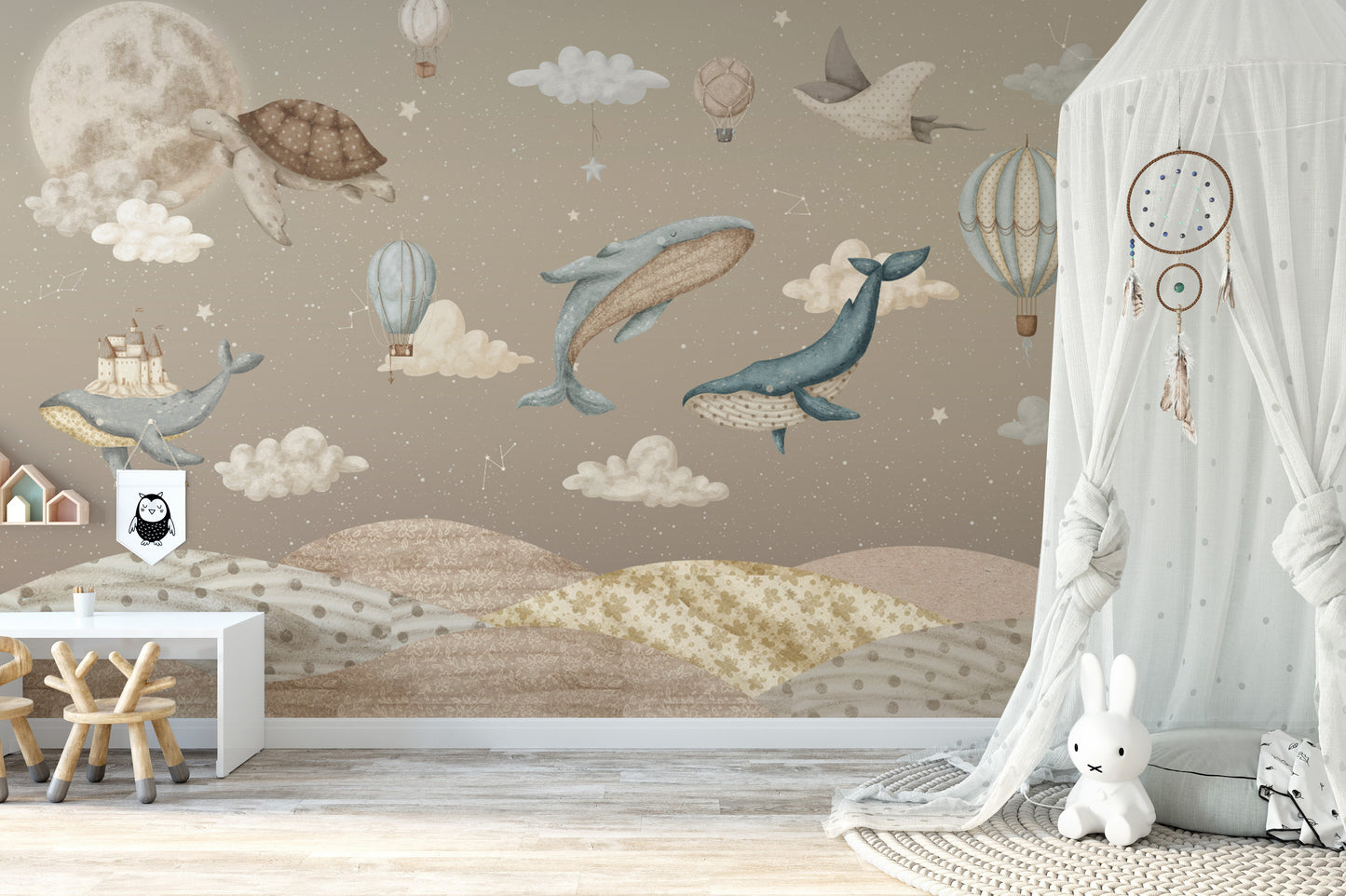 Hot air balloons and flying whales in a fantasy mural
