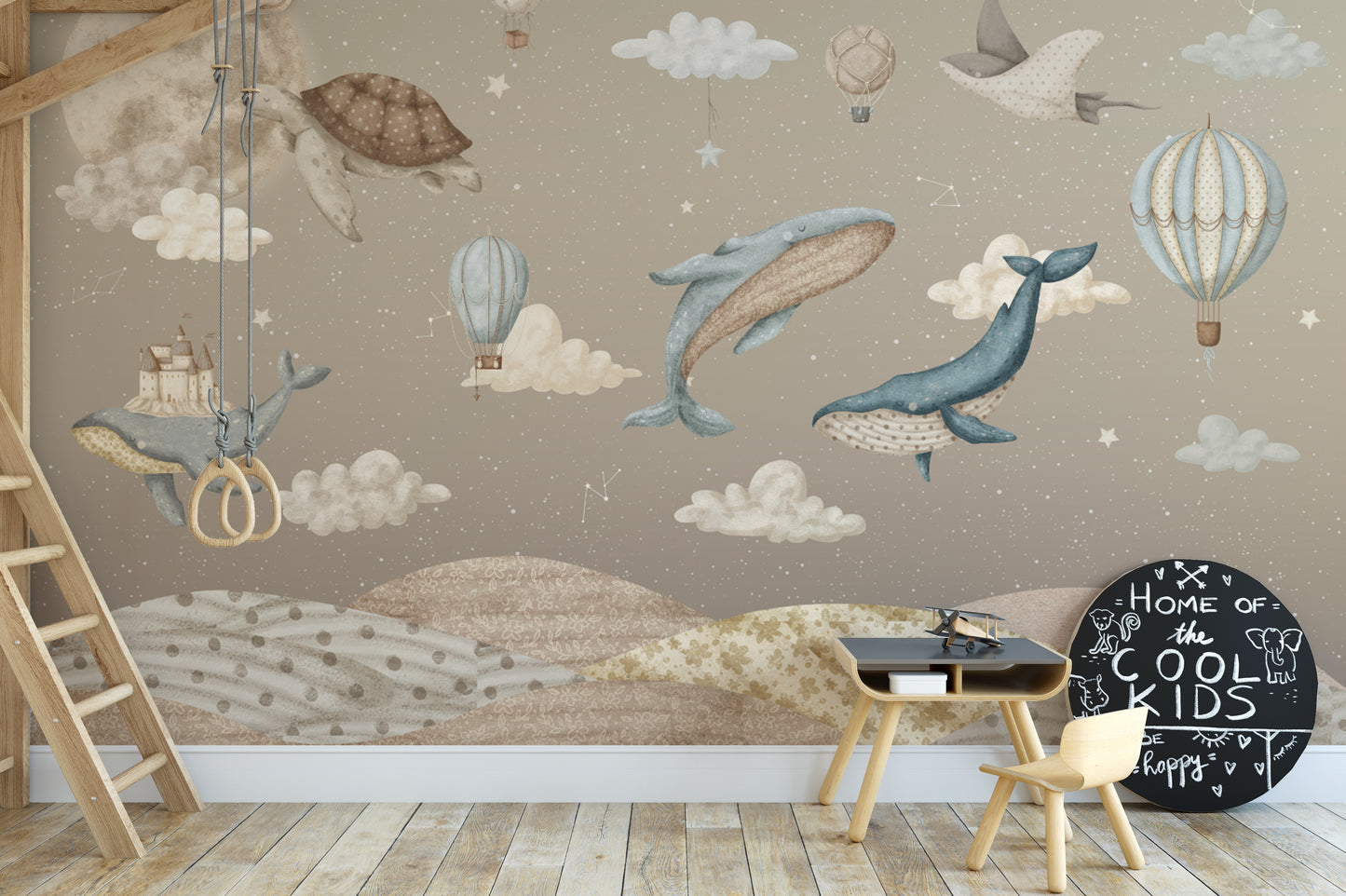 Celestial-themed whale wallpaper with soft, muted colors
