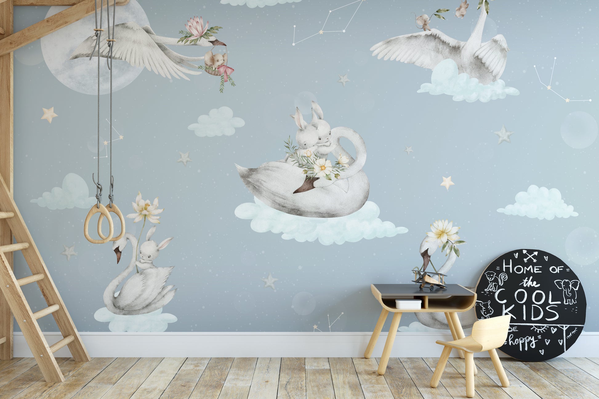 Soft blue nursery wallpaper with swans and clouds
