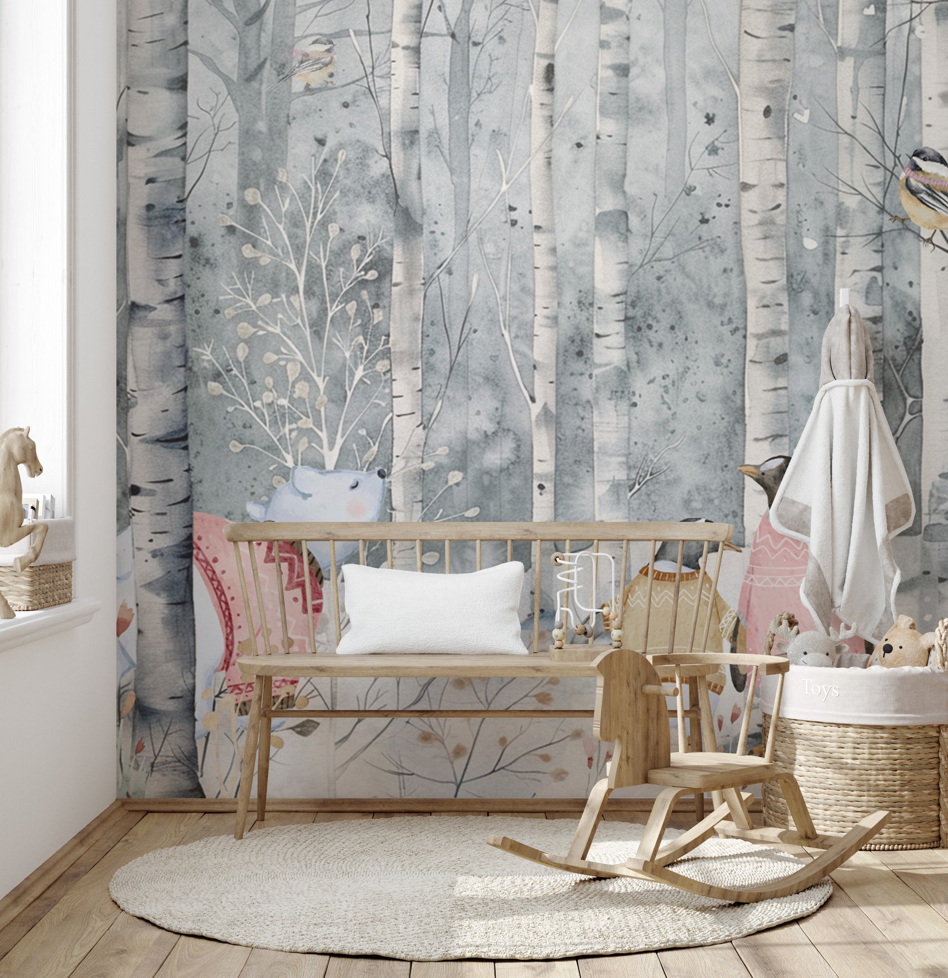 Winter-themed kids' room mural with woodland creatures




